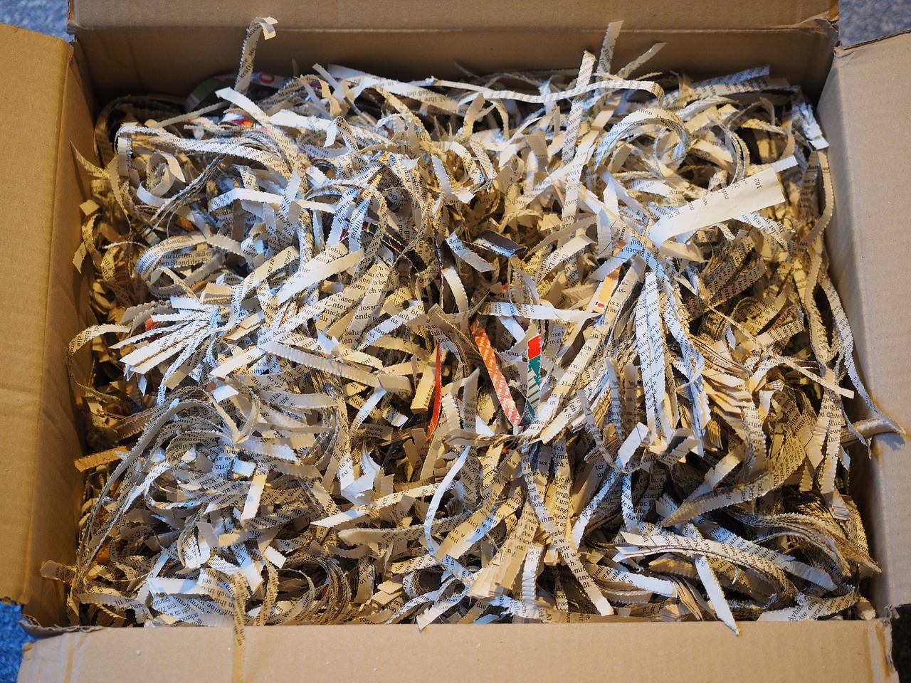 Shredded paper in box